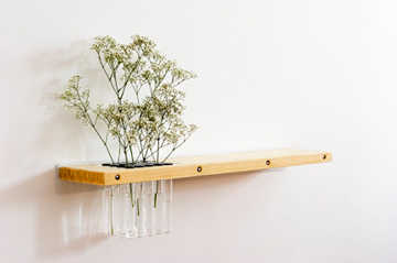 Arrange Wall Shelf Integrates Nature into the Design.